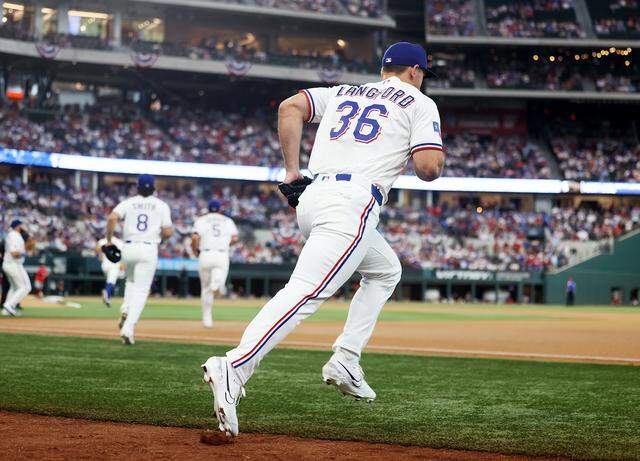 The Texas Rangers take the field for their home opener against the Cincinnati Reds on Friday, April 3, 2026.